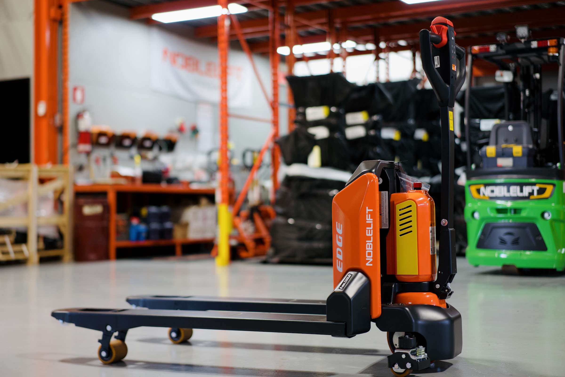 Noblelift EDGE electric walkie pallet jack in a warehouse
